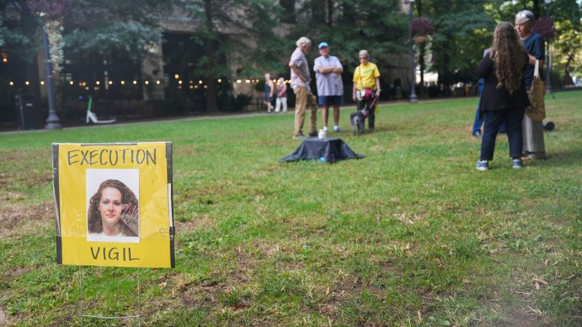 Demonstrators hold a vigil for Christa Pike