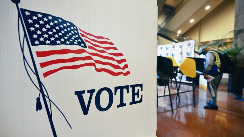 People cast their ballots at a vote center in Los Angeles, on November 4, 2025, where Proposition 50 is the only measure on the ballot in the state’s special election. Californians were voting November 4 in a ballot measure likely to further tilt the liberal state towards the Democrats, as the party seeks to neutralize gerrymandering ordered by President Donald Trump. (Photo by Frederic J. BROWN / AFP) (Photo by FREDERIC J. BROWN/AFP via Getty Images)