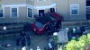 2 rescued after car smashes into house in Jamaica Plain