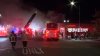 Massive fire damages Somerville businesses, sends 2 firefighters to hospital