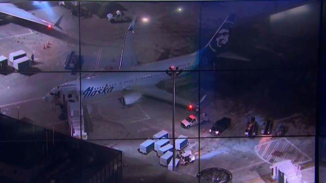 Bound plane strikes truck on Boston taxiway; no injuries